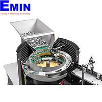 Vibrating hopper provides automatic workpiece