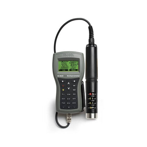 Technician handling portable gas detection and air quality measurement instruments