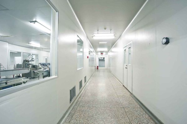 Cleanroom wall panel system used in a controlled industrial environment
