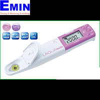 Technician checking a potassium measurement instrument in a laboratory environment