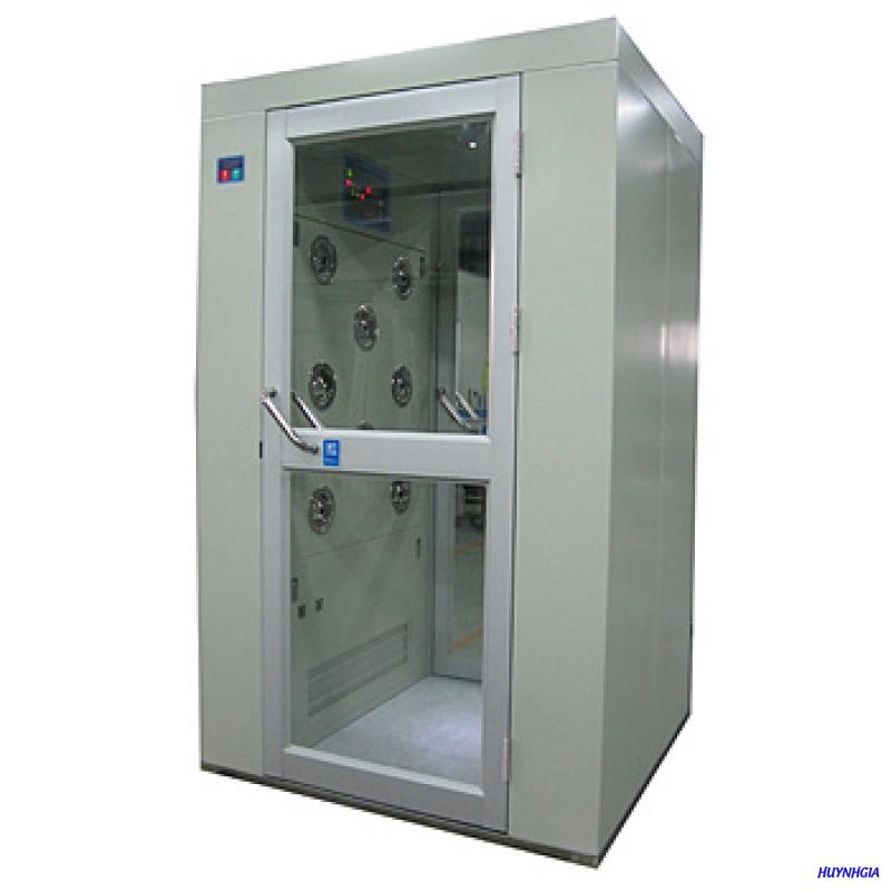Cleanroom air shower used at an entry point to reduce particle carry-in