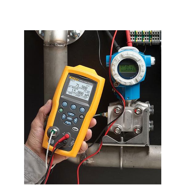 Technician handling precision calibration and repair equipment
