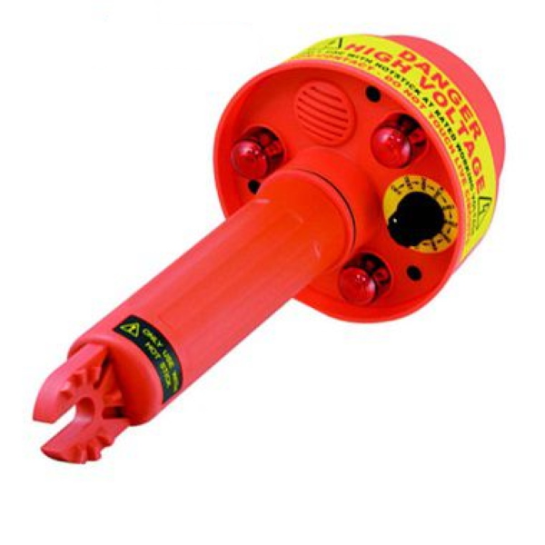 Technician servicing a high voltage electrical test instrument